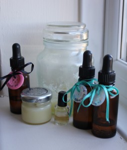 Some of my homemade supplies: sugar scrub, oils for hair and face, balm, and a little bit of vinegar toner.